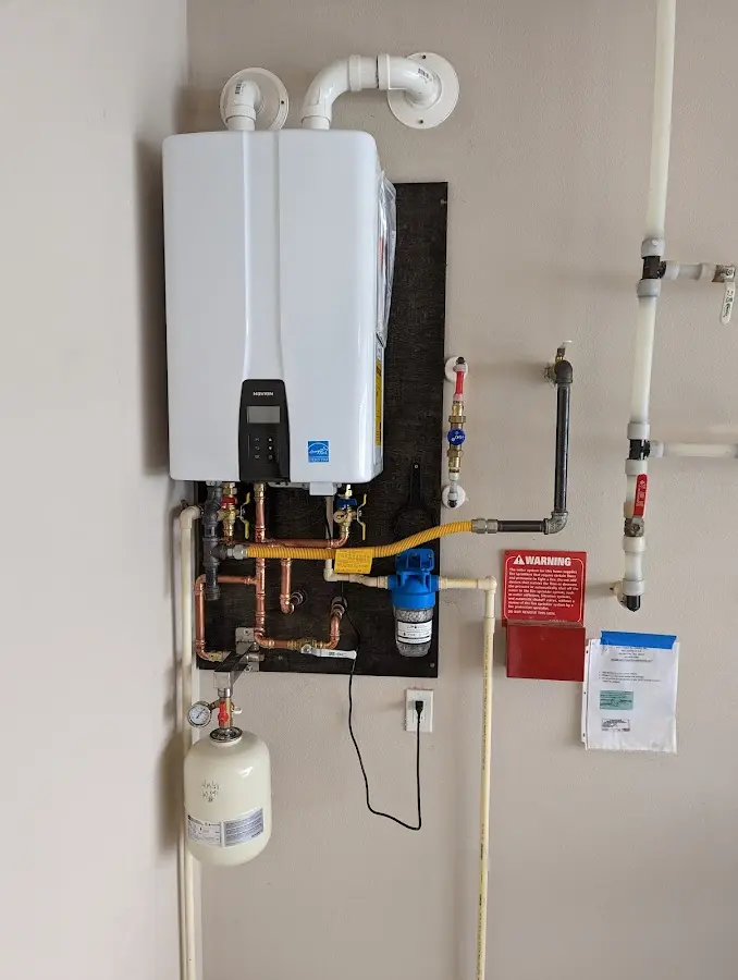 Professional plumber installing copper piping in a Stevenson Ranch home